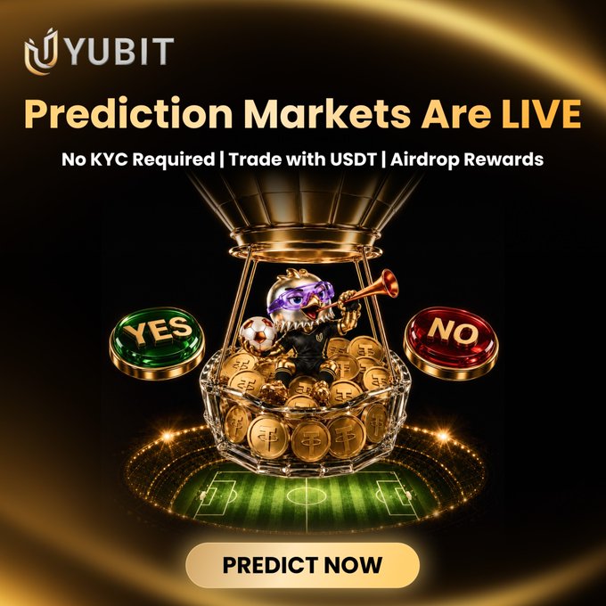 In this image, there are three golden coins floating above a sports field that appears to be the soccer field of the World Cup. The text below reads "Prediction Markets are officially LIVE on @YUBIT_Exchange With the World Cup around the corner, you can now predict match outcomes directly on YUBIT No KYC required Trade directly with USDT SimpleYES/NO predictions Try it out NOW". The coins and the sports field appear to be related, as both could represent a predicted outcome of the soccer matches.