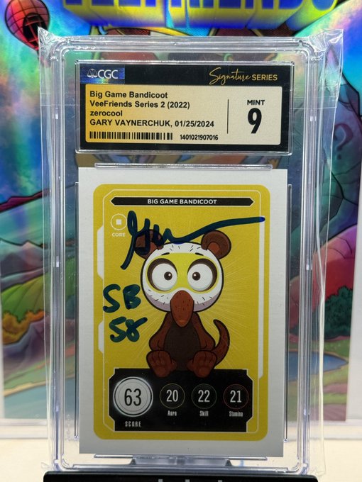 A graded CGC Signature Series trading card is encased in plastic, featuring a cartoon bandicoot character. The card is titled "Big Game Bandicoot" from "VeeFriends Series 2 (2022)" with a Mint 9 rating, signed by Gary Vaynerchuk with 'SB' and 'SK' inscribed.