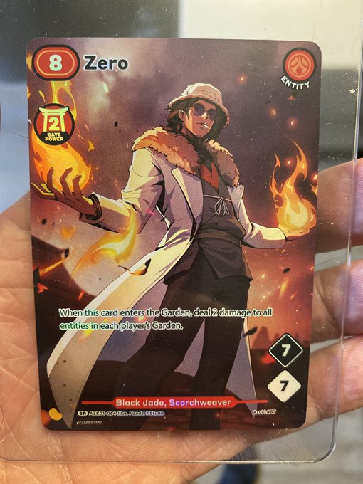 A trading card featuring 'Zero,' a Black Jade entity character with rate power 2, stats 7/7, and an ability that deals 2 damage to all entities when entering the Garden.