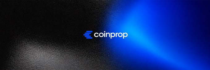 A sleek dark promotional banner featuring the "coindrop" logo with a stylized "C" icon in blue and white against a textured black and blue gradient background, visually representing the crypto prop trading platform partnership described in the announcement.