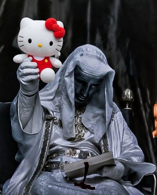 The image shows a silver-suited, masked figure draped in flowing robes holding up a Hello Kitty plush toy, alongside a bound book, set against a dark backdrop—evoking a cryptic, almost ritualistic aesthetic. The caption plays on the post's theme of betting on $kitty vs $doge, framing the absurdity of $kitty fans as a "crazy" gamble, with the masked cult-like figure presenting Hello Kitty as an unlikely object of devotion.