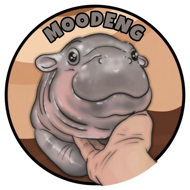 A circular meme illustration of a hairless creature with large eyes being held by a hand, with the word 'MOODENG' written across the top.