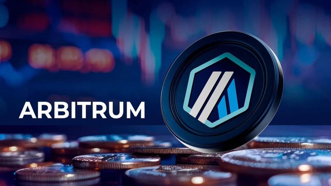 The 'ARBITRUM' cryptocurrency logo is prominently displayed next to a dark coin featuring its geometric symbol, surrounded by stacks of other coins against a blurred blue background with charts.