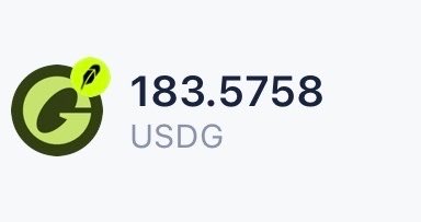 Displays a USDG token logo with a green circular emblem containing a leaf, showing a balance of 183.5758 USDG.