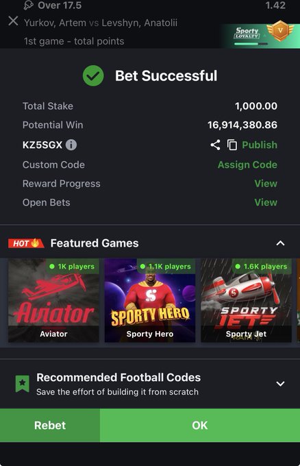 A mobile betting app screenshot displays a successful bet confirmation for a match between Yurkov, Artem and Levshyn, Anatolii, showing a 1,000.00 stake with a potential win of 16,914,380.86 under the custom code "KZ5SGX." The screen also features a "Rebet" option, a "Publish" button for sharing the bet, and promotional banners for games like Aviator, Sporty Hero, and Sporty Jet below.