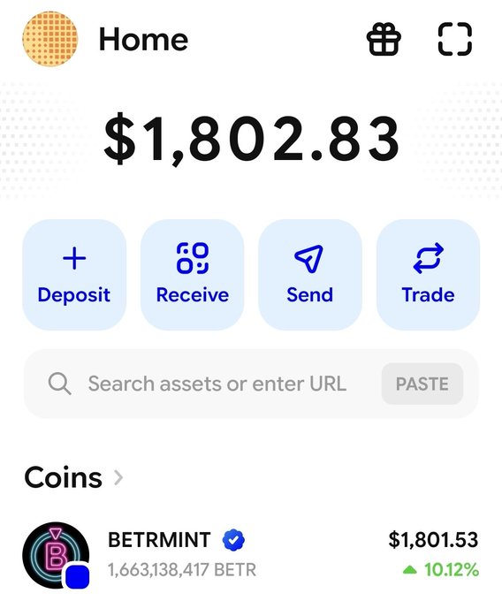 A crypto wallet home screen showing a balance of $1,802.83 with Deposit, Receive, Send, and Trade options, highlighting BETRMINT (BETR) coin at $1,801.53 with a 10.12% increase.