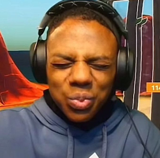 A close-up image of a young man wearing headphones and a blue hoodie with his eyes closed and lips pursed in an exaggerated expression, appearing to be reacting emotionally while streaming or recording. The number "114" is visible in the background, and his expressive face humorously captures the "giving everyone spots to share" vibe of the NFT being discussed.