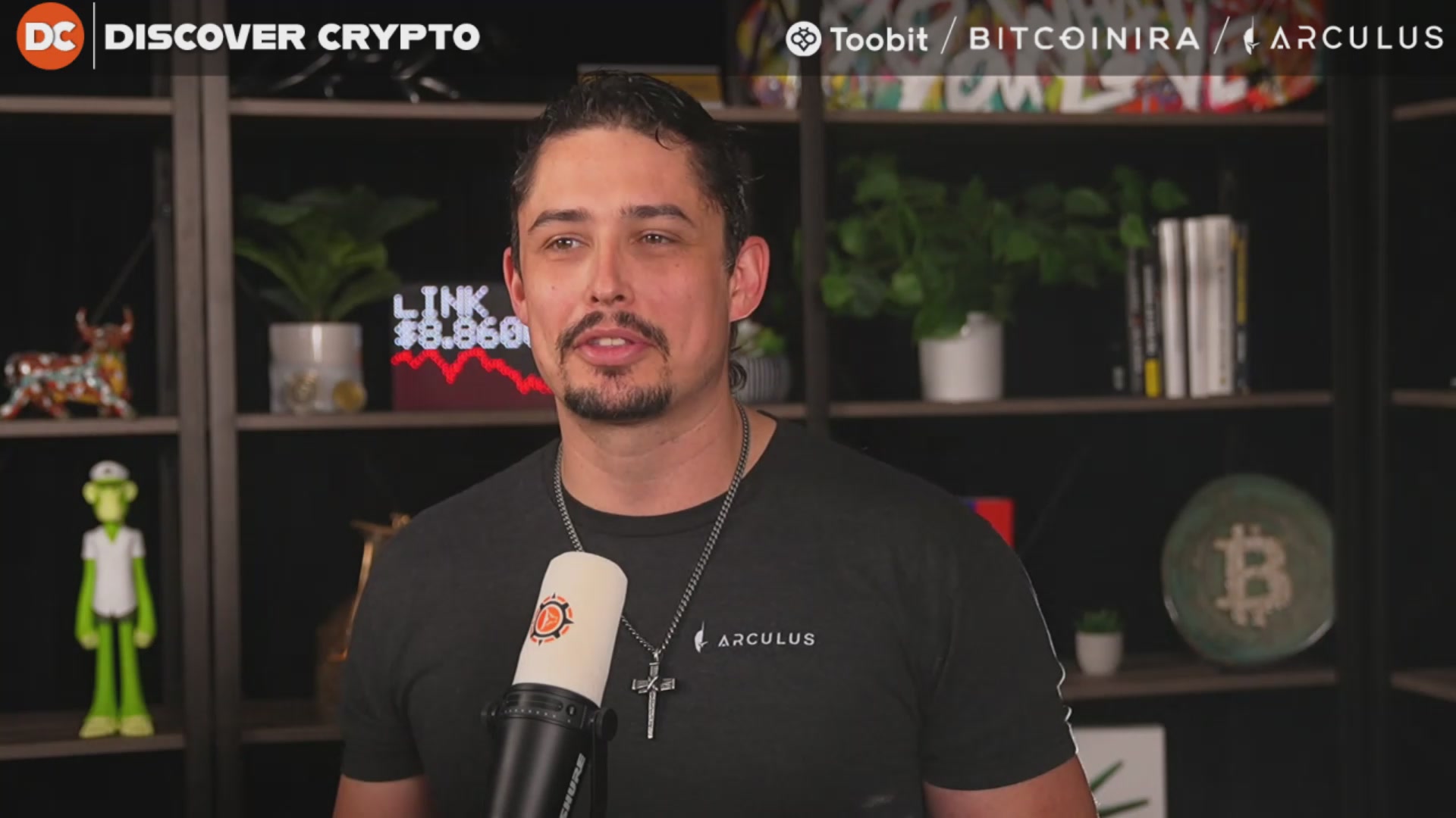 The image features a man wearing a black shirt, standing in front of a bookshelf with various items displayed on it. The man appears to be talking into a microphone or speaking into an open laptop computer. The background includes a bookshelf filled with numerous books and potted plants. The post about Bitcoin being a lie is related to the image because it suggests that the man might have been involved in selling Bitcoins, which would explain why he's standing in front of the bookshelf and talking into a microphone or laptop computer.
