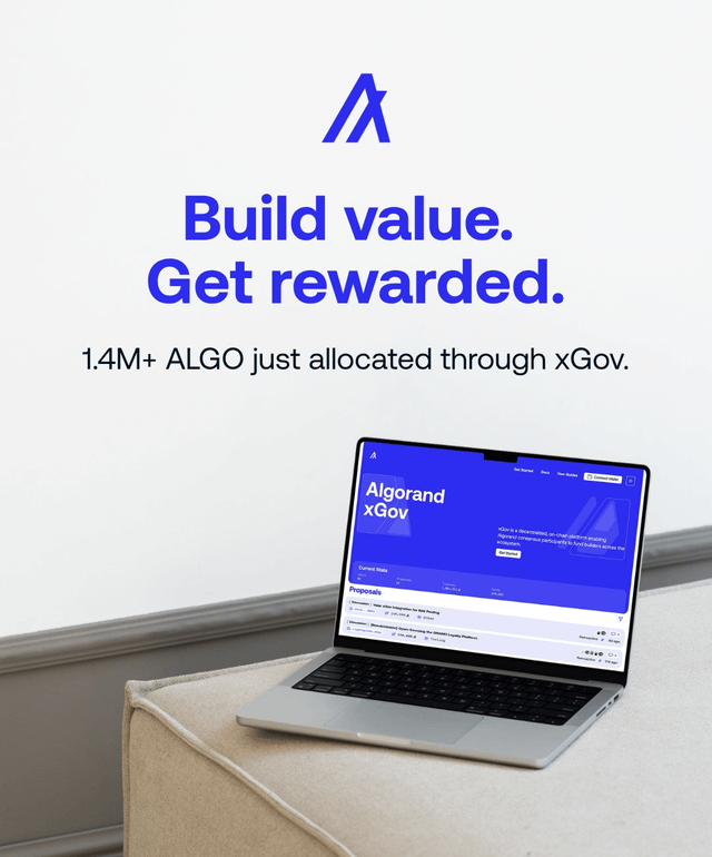 The image shows a laptop computer sitting on top of a couch or chair with its screen open. The background appears to be a white wall. Below the laptop, there is text that reads "Build value. Get rewarded." This suggests that the laptop might have been used for work purposes and could potentially be a reward for completing tasks or projects successfully.