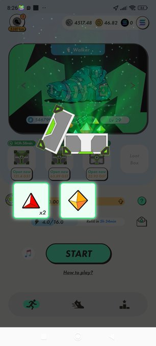 The image shows a phone screen with an app icon, which appears to be a game or puzzle. There are three icons displayed on the screen - one red triangle, one yellow triangle, and one green square. The text "START" is also visible in the image. The background of the image features a cartoon turtle, suggesting that this might be a mobile game or an interactive app designed for children.