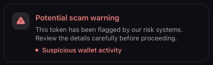 The image displays a "Potential scam warning" alert indicating the token has been flagged due to "Suspicious wallet activity," which humorously aligns with the poster's observation that they only receive such warnings when friends ("day ones") send them contract addresses.
