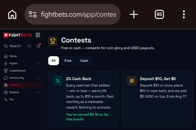 The image shows the Contests page on fightbets.com/app/contes, displaying two promotional offers: a "2% Cash Back" reward where users earn back on every settled cash bet (up to $10/month, with the user having earned $0.18 so far this month), and a "Deposit $10, Get $5" promotion offering a $5 USDC bonus for deposits and cash bets ending August 17. The page illustrates the new rewards system mentioned in the post, visually highlighting both the cashback offer and the deposit bonus available to users.
