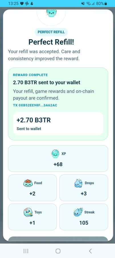 A mobile app screen displays a "PERFECT REFILL!" notification, confirming that 2.70 B3TR has been sent to the user's wallet via transaction TX 0XB52EE98F...3A62AC, along with rewards of +68 XP, +2 Food, +3 Drops, +1 Toys, and a 105 Streak.