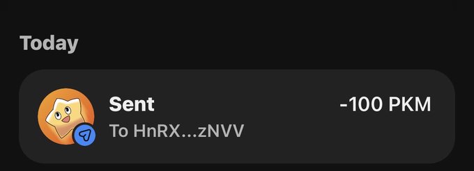 A transaction notification showing "-100 PKM" sent to address "HnRX...zNVV" under "Today," indicating a 100 PKM transfer, likely the prize being awarded to the next winner referenced in the post.