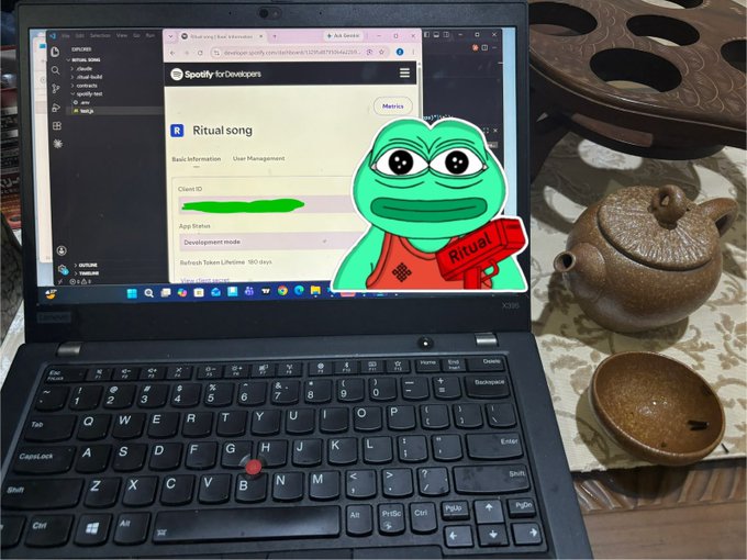 A ThinkPad laptop displays a Spotify for Developers page titled 'Ritual song', overlaid with a Pepe frog graphic holding a 'Ritual' sign, next to a clay teapot.