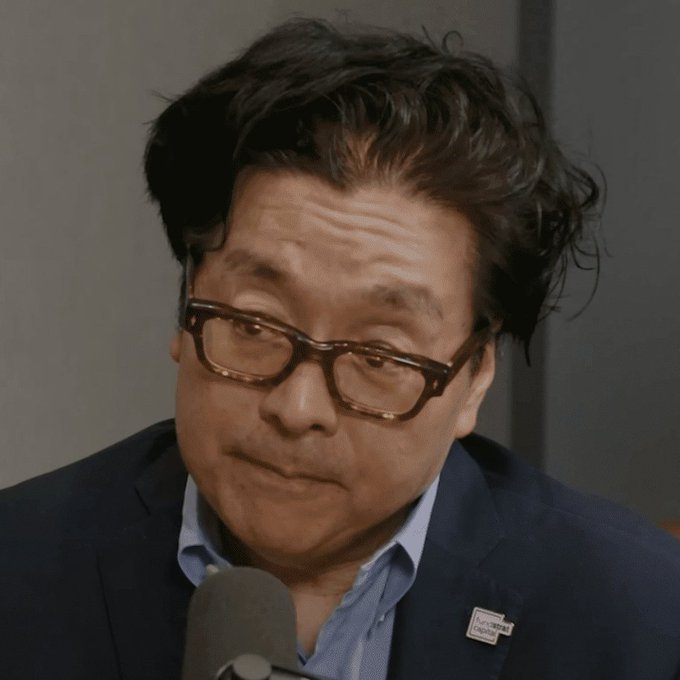 The image features an older man wearing glasses, possibly a news anchor or a public figure, with his head tilted back as if he's speaking into a microphone. The caption reads "LATEST: Tom Lee says Strategy’s $BTC sale and record ETF outflows are classic bottom behavior," which is related to the post about Bitcoin.

The image also contains some text that reads "focus on what is in the image and how it relates to the post." This suggests that the main focus of the image should be on Tom Lee's statement, rather than other elements in the scene.