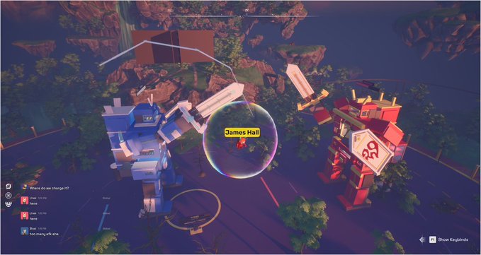 A screenshot from a video game shows giant mechs in a forest setting, with a player named "James Hall" highlighted and a location labeled "Blue Kingdoms" in the corner.
