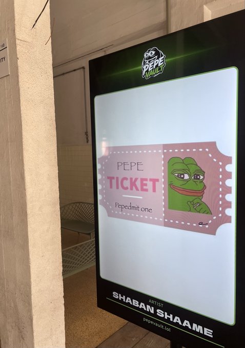 A digital display at a Pepe Vault event showcases a 'PEPE TICKET' NFT for 'Fepedmit one' by artist 'SHABAN SHAAME'.