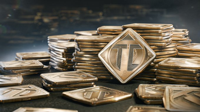 Stacks of gold-colored coins and bars branded with a prominent "T" logo are displayed, visually symbolizing the Tarcoin cryptocurrency giveaway offering 3,000,000 TAR (approximately $30,000) to limited participants using promo code FREETARCOINS.