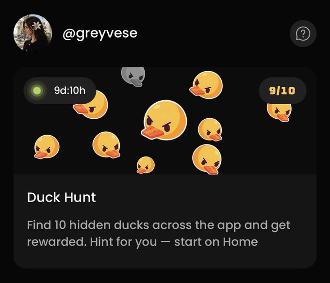 A screenshot of a 'Duck Hunt' challenge notification from user @greyvese, displaying a 9d:10h timer and 9/10 progress, with the instruction to find 10 hidden ducks across the app and a hint to start on Home.
