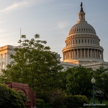 A scenic view of the U.S. Capitol dome in Washington D.C. at sunset, framed by green trees, with the watermark '@watchemewsx'.