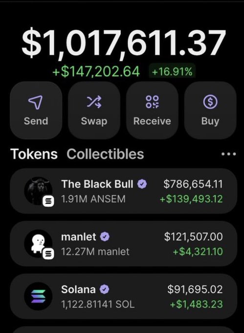 A crypto wallet screenshot showing a portfolio balance of $1,017,611.37 (+$147,202.64 or +16.91%), with top holdings including 1.91M ANSEM ($786,654.11) valued as "The Black Bull," 12.27M manlet ($121,507.00), and 1,122.81141 SOL ($91,695.02). The image illustrates a massive gain on $ANSEM, aligning with the post's claim that the token "changed my life" and offering to retire those who engage.