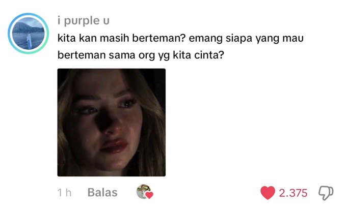 A social media post from user 'i purple u' containing Indonesian text reading 'kita kan masih berteman? emang siapa yang mau berteman sama org yg kita cinta?' alongside a sad video thumbnail, with 2,375 likes.