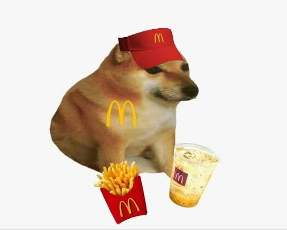 A Shiba Inu dog dressed as a McDonald's employee wearing a red visor, accompanied by french fries and a drink, with the McDonald's 'M' logo edited onto the dog's body.