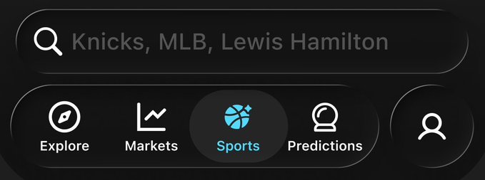 A close-up of a dark-themed app interface displays a search bar reading "Knicks, MLB, Lewis Hamilton" above a navigation menu with options for Explore, Markets, Sports (highlighted with a basketball icon), Predictions, and a profile button. The image visually reinforces the post's message by showcasing the platform's unified search functionality, allowing users to seamlessly access diverse markets—sports, finance, and predictions—within a single app.