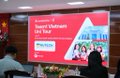 A slightly blurry image shows an audience seated in a conference room watching a presentation on a large screen, which displays a slide with a picture of a man and the text 'List of TGE Investors' and 'Crypto industry'.