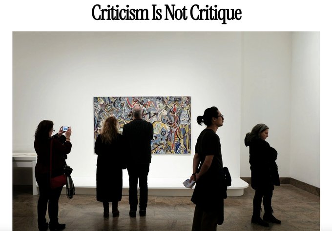 A group of visitors in silhouette view a colorful abstract painting in a white-walled gallery, beneath the header text "Criticism Is Not Critique." The image visually echoes the post's message about the art world's tendency to equate thoughtful critique with mere jealousy or bitterness, showing an audience superficially engaging with a work rather than critically examining it.