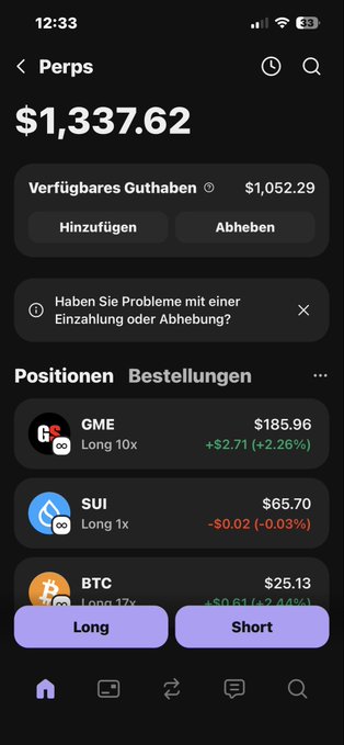 The image shows a smartphone screen displaying information about cryptocurrency trading, specifically Bitcoin prices over time. There are multiple lines of text representing different types of transactions or market data. The majority of these lines include numbers related to Bitcoins and their current value at the time the photo was taken. Some words like "long" and "short" may also be present in this context. The screen appears to be focusing on Bitcoin trading and possibly other cryptocurrencies, providing information about potential gains or losses for users of the app.