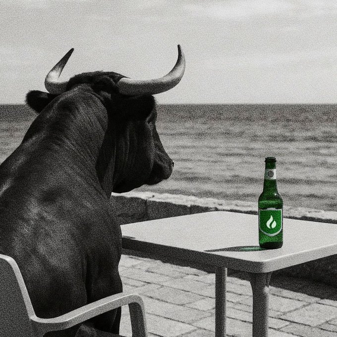 A surreal black-and-white photograph of a bull sitting at a table by the ocean with a green Sprite bottle, with only the bottle shown in color.