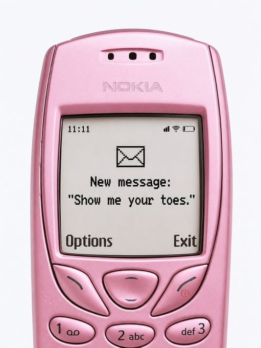 A pink Nokia phone displays a "New message" notification reading "Show me your toes." on its screen, alongside the time 11:11 and signal indicators. The image humorously plays on the typical "You have one new message" notification, showing the unexpected content of the received text.