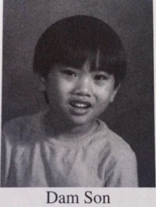 A grainy childhood school portrait of a smiling young child, captioned 'Dam Son' at the bottom.