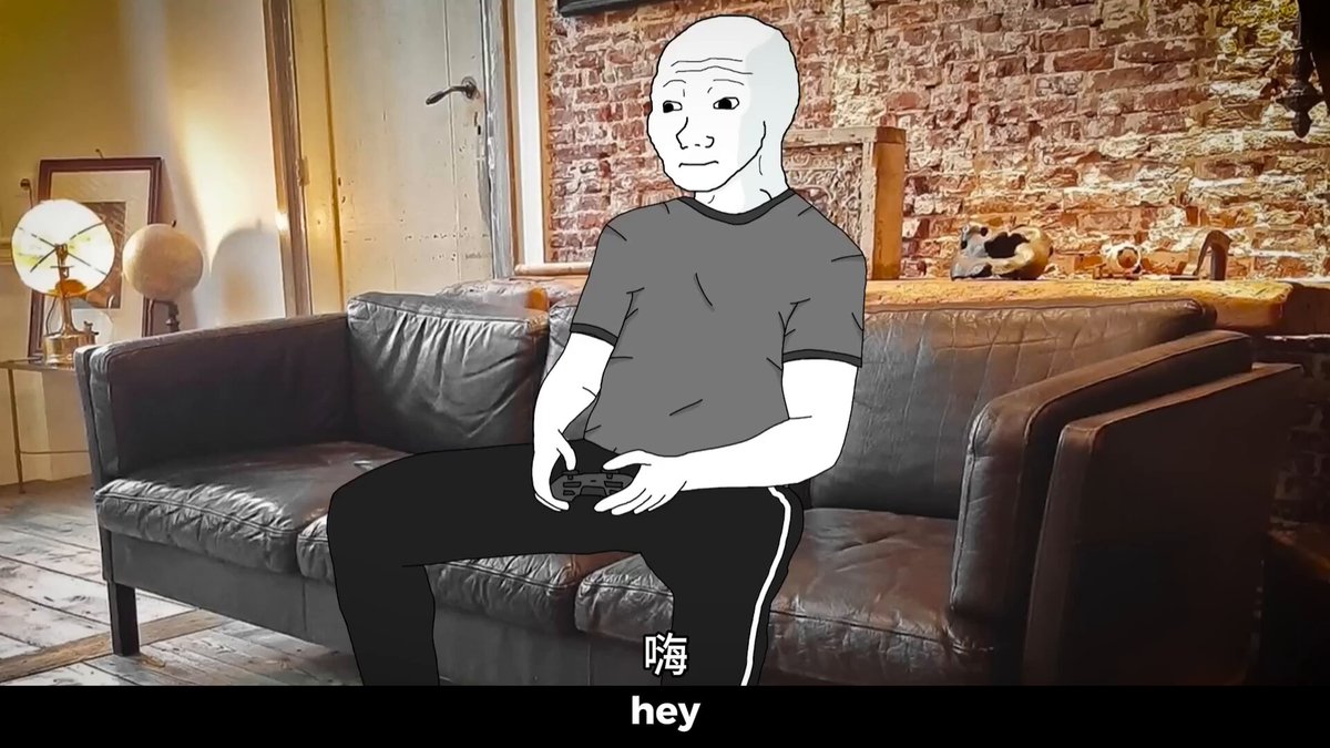 The image features a man sitting on a couch with his arms crossed while wearing a gray shirt. The caption of the image reads "Hey, Bitcoin is falling, $Wojak holds steady! Did you see if Wojak felt it in the video?". This suggests that there might be an ongoing discussion or event related to Bitcoin and its value, as indicated by the man's body language and the presence of a couch. The post seems to be discussing the current state of Bitcoin and how it is affecting people like Wojak who are holding onto their Bitcoins.
