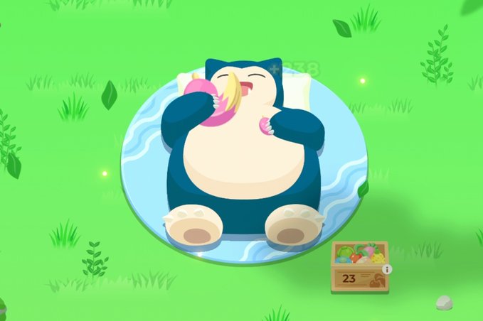 A Snorlax Pokémon character lies on a blue mat eating a pink donut, with an item counter showing '23' next to a chest of berries.