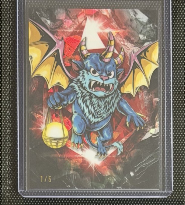 A trading card featuring a fierce blue dragon-like creature with yellow horns, wings, and claws, holding a glowing yellow lantern, numbered '1/5' at the bottom left.