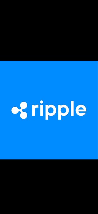 The image features a blue square sign that says "ripple" written in white letters, with three circles surrounding the word. The background of the image is black, which contrasts with the blue square sign. There are no other objects or texts present in the image.