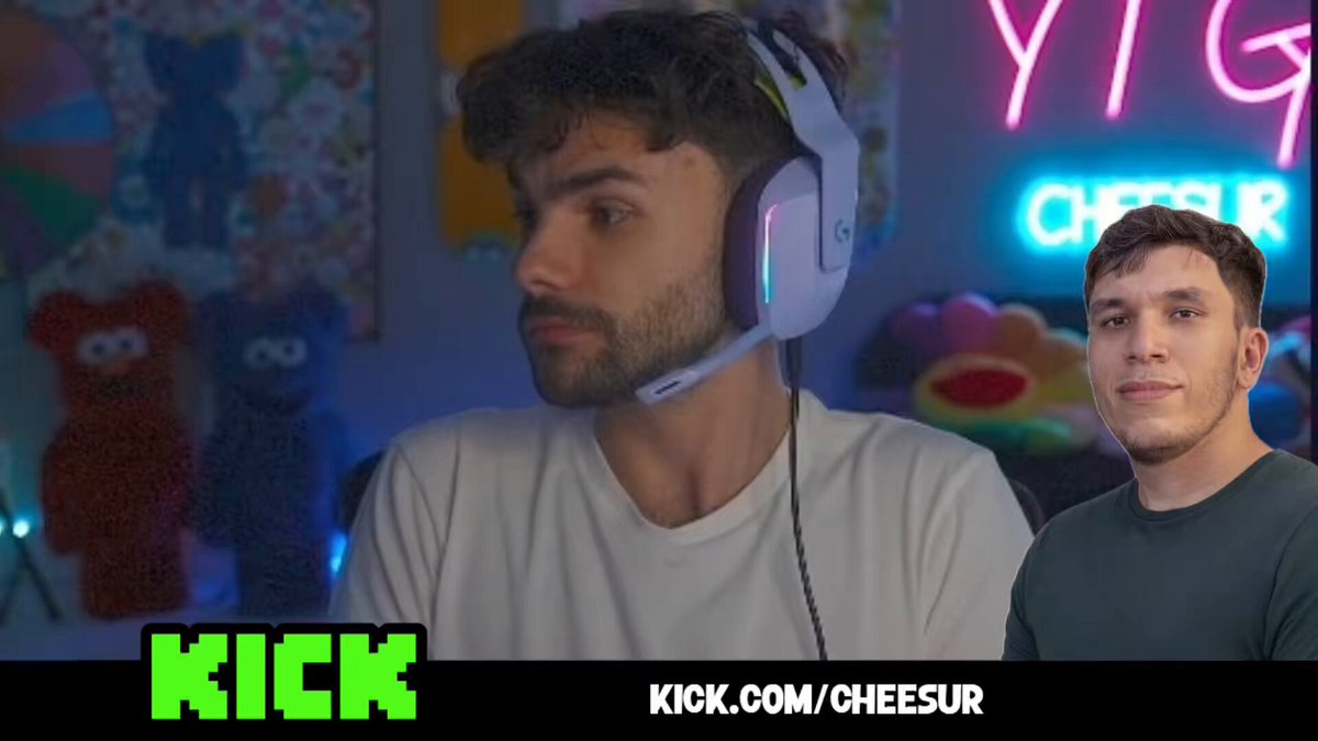 The image features a man wearing headphones, possibly playing a video game or listening to music, with another person standing behind him. The background includes a neon sign that reads "YOGG Cheesur", suggesting they are in a gaming convention or event related to the popular streaming platform YOGG. A caption below the image reads "KICK.com/Cheesur".