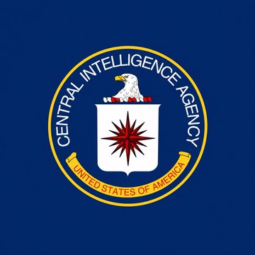 The image features a blue circle with the words "Central Intelligence Agency" written inside of it, surrounded by an eagle emblem. Below the circle, there's text that reads "United States of America". The main focus of the image is a red star positioned in the center of the circle. The text "Bitcoin fixes this" is located below the star and appears to be related to Bitcoin or cryptocurrency.