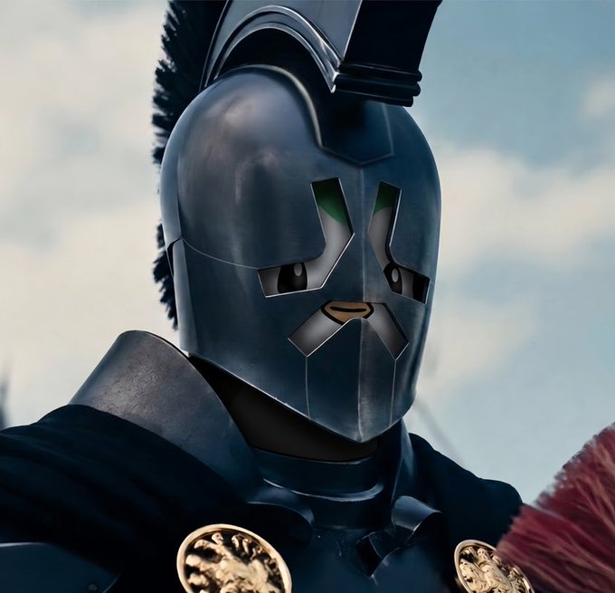 A stern-faced warrior in dark, polished armor and a Corinthian-style helmet gazes outward, his expression serious and battle-ready as if preparing for an impending charge. The post's caption "get ready for the bull posts" cleverly mirrors the warrior's stoic, charging stance—suggesting the author is locked in and armored up for the upcoming bullish rally on AbstractChain.