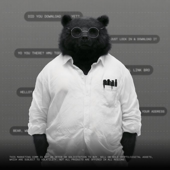 A black bear wearing round glasses and a white button-up shirt with pens in the pocket stands in front of floating chat bubbles containing messages like "DID YOU DOWNLOAD X YET?" and "HELLO?". A disclaimer at the bottom warns that the marketing communication is not an offer to buy, sell, or hold crypto/digital assets, which are subject to volatility. The image aligns with the post's cautionary message by pairing the skeptical-looking bear with prompts urging the viewer to verify and download, embodying the "double-check everything" sentiment.
