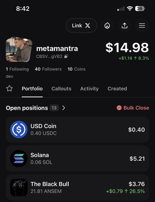 A screenshot of the Polymarket portfolio for user "metamantra" (wallet CBSV...gVB2) shows a total value of $14.98, up 8.3%, including an open position of 21.81 $ANSEM in "The Black Bull" market currently valued at $3.76 (+26.5%), supporting their post about holding 21 $ANSEM to uplift their community.