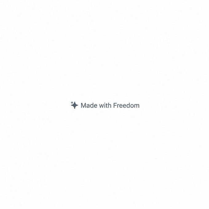 A minimalist white screen displays a small dark icon and the text "Made with Freedom" in the center.