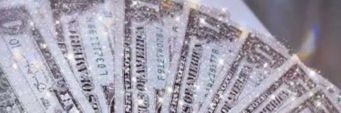 A close-up image showing U.S. currency (banknotes) arranged in a fan pattern with sparkly, glittery visual effects.