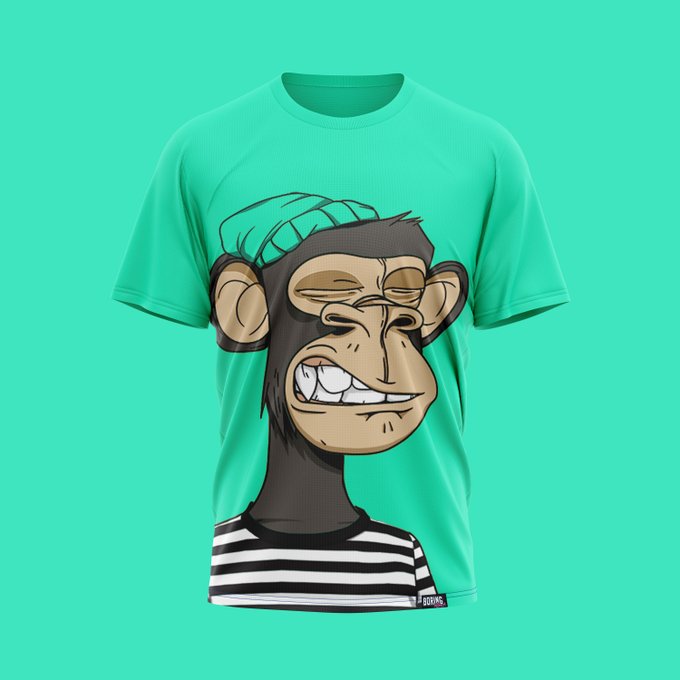 A mint green t-shirt featuring a cartoon graphic of a monkey or ape wearing a striped black and white shirt and a green beanie, displayed against a matching mint green background.
