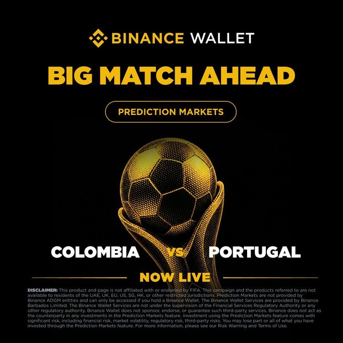 The image is a Binance Wallet promotional graphic featuring a golden soccer ball with the text "BIG MATCH AHEAD," "PREDICTION MARKETS," "COLOMBIA vs PORTUGAL," and "NOW LIVE," promoting a live prediction market for the Colombia vs. Portugal football match.