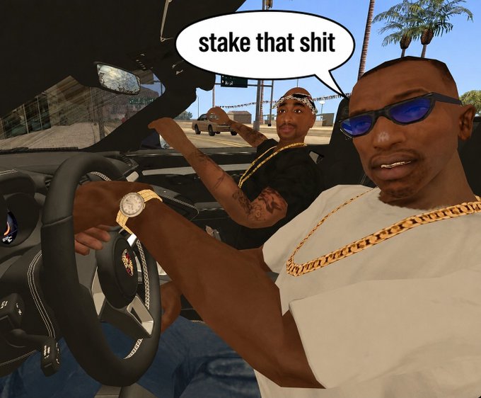 A screenshot from the video game Grand Theft Auto V showing two characters in a convertible with a speech bubble reading 'stake that shit'.