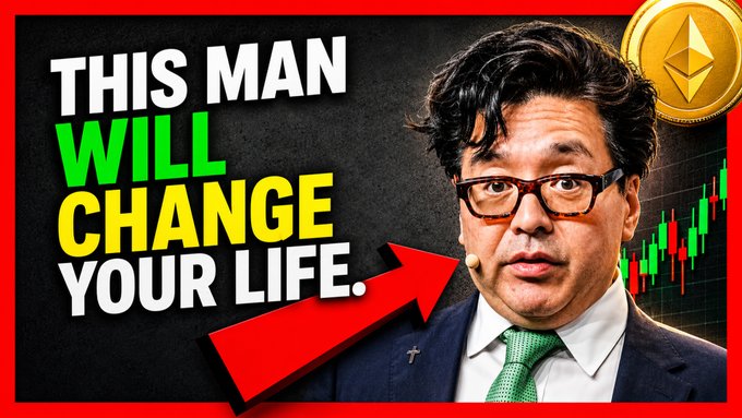 The image appears to be a YouTube thumbnail featuring a man in a suit and glasses, with bold text reading "THIS MAN WILL CHANGE YOUR LIFE" alongside an Ethereum logo and a green stock chart. The thumbnail promotes a video link described as "The Greatest Ethereum Explanation of ALL TIME!" aimed at viewers interested in learning about Ethereum cryptocurrency.